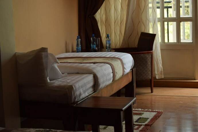 Imagen de la habitación del Hotel Esikar Gardens. Foto 15