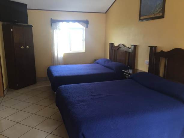 Imagen de la habitación del Hotel Esmeralda Barrancas. Foto 10