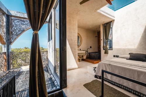 Imagen de la habitación del Hotel Esmeralda Boutique and Residences. Foto 19