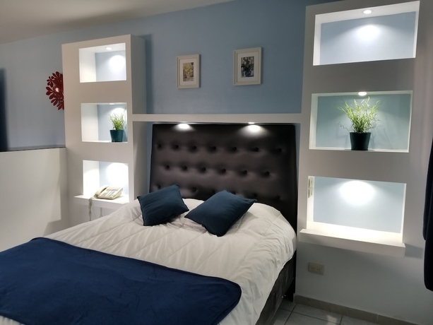 Imagen de la habitación del Hotel Esmeralda Guest House. Foto 7