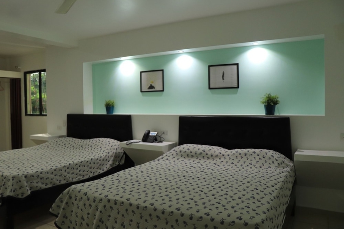 Imagen de la habitación del Hotel Esmeralda Guest House. Foto 12