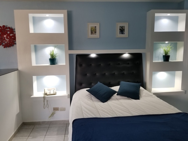 Imagen de la habitación del Hotel Esmeralda Guest House. Foto 13