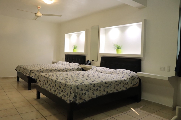 Imagen de la habitación del Hotel Esmeralda Guest House. Foto 14