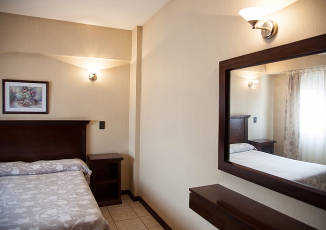 Imagen de la habitación del Hotel Esmeralda Palace. Foto 12