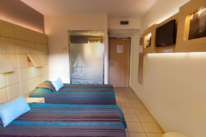 Imagen de la habitación del Hotel Espace Cité. Foto 7