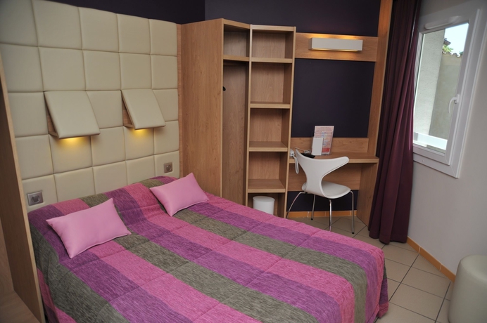 Imagen de la habitación del Hotel Espace Cité. Foto 11