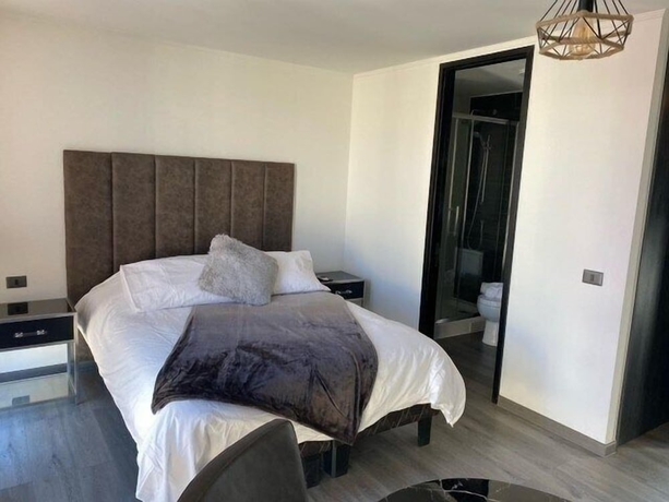 Imagen de la habitación del Hotel Espacio Huerfanos. Foto 8