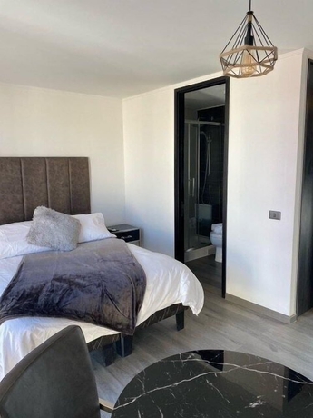 Imagen de la habitación del Hotel Espacio Huerfanos. Foto 9