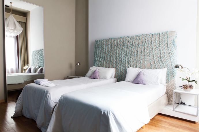 Imagen de la habitación del Hotel Esplendor By Wyndham Buenos Aires. Foto 9