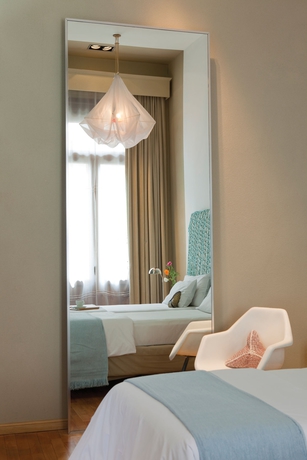 Imagen de la habitación del Hotel Esplendor By Wyndham Buenos Aires. Foto 10