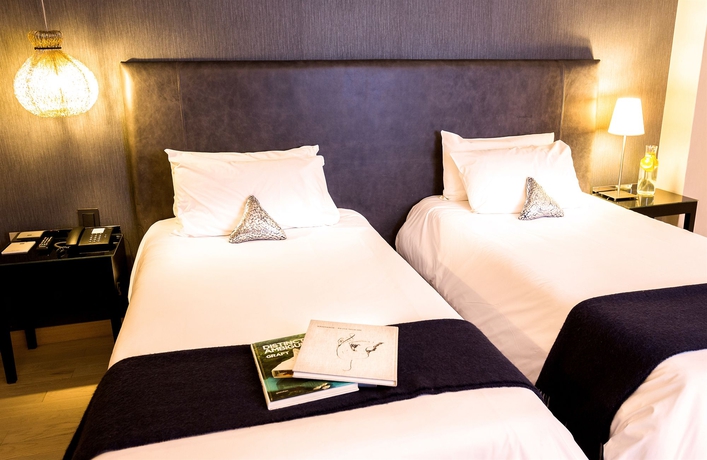 Imagen de la habitación del Hotel Esplendor By Wyndham Buenos Aires Plaza Francia. Foto 10