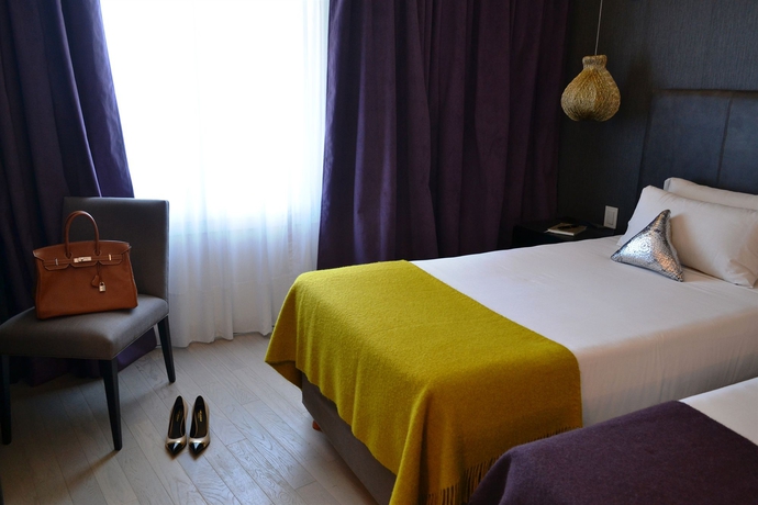 Imagen de la habitación del Hotel Esplendor By Wyndham Buenos Aires Plaza Francia. Foto 11