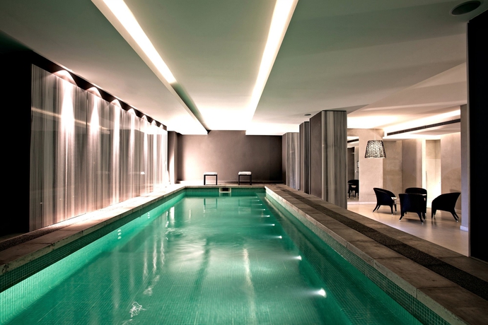 Imagen de la piscina del Hotel Esplendor By Wyndham Montevideo Cervantes. Foto 16