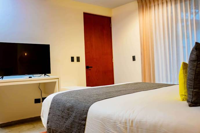 Imagen de la habitación del Hotel Esplendor By Wyndham Tulum Nook. Foto 5