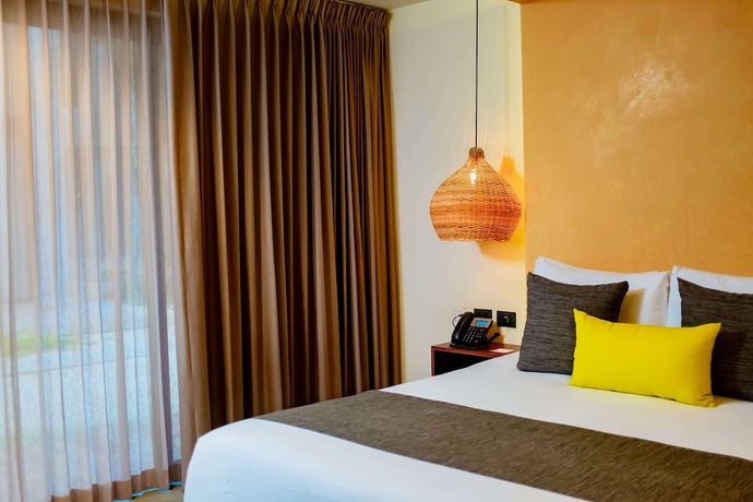 Imagen de la habitación del Hotel Esplendor By Wyndham Tulum Nook. Foto 9