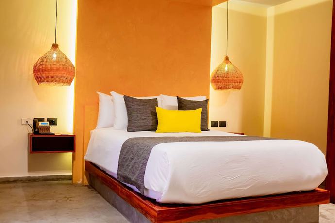 Imagen de la habitación del Hotel Esplendor By Wyndham Tulum Nook. Foto 10