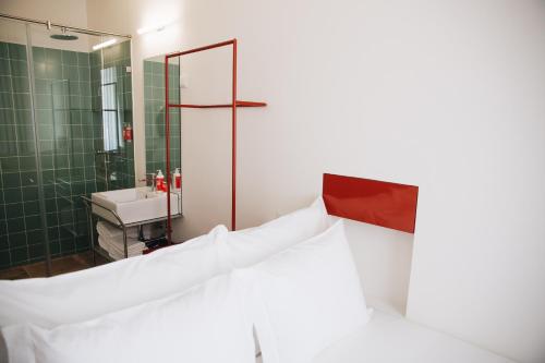Imagen de la habitación del Hotel Esqina Cosmopolitan Lodge. Foto 2