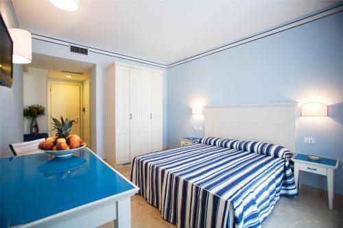 Imagen de la habitación del Hotel Essence Favignana - Cala la Luna Resort. Foto 12