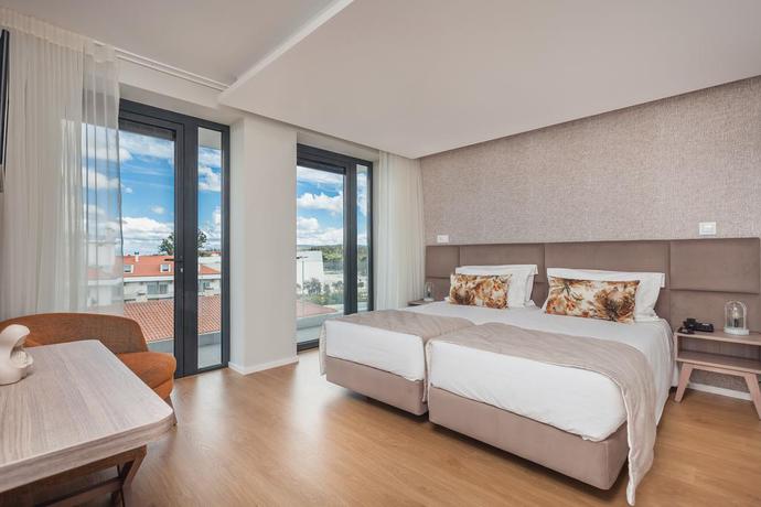 Imagen de la habitación del Hotel Essence Inn Marianos. Foto 7