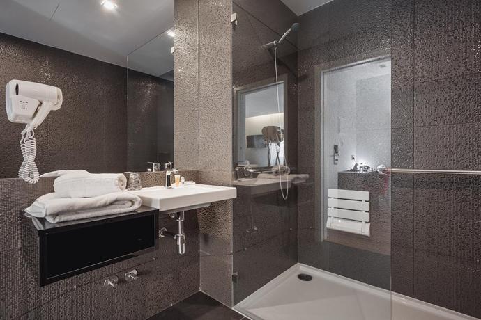 Imagen de la habitación del Hotel Essence Inn Marianos. Foto 10