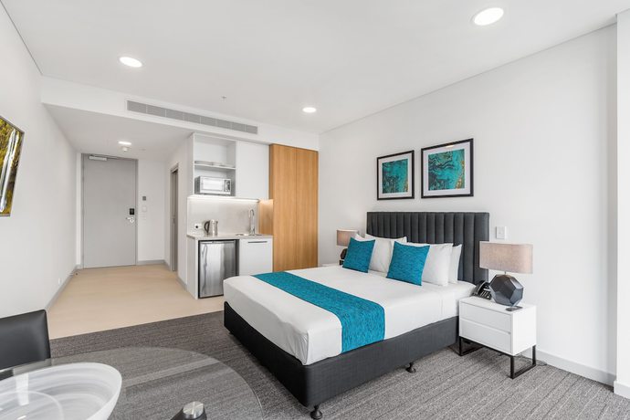 Imagen de la habitación del Hotel Essence Suites Taringa. Foto 14