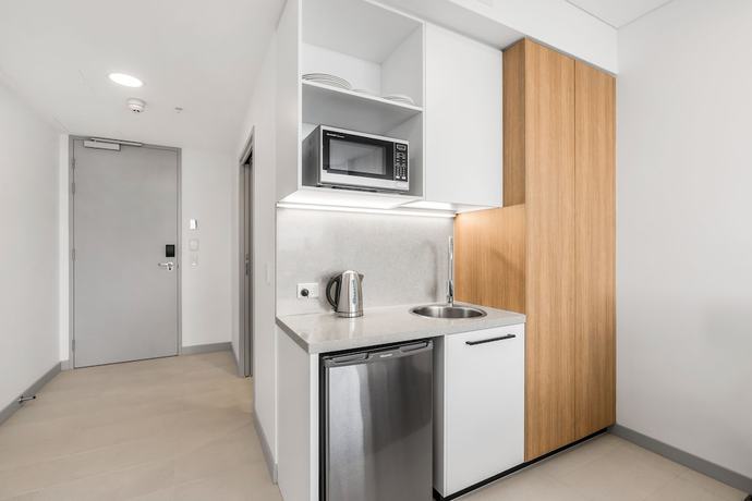 Imagen de la habitación del Hotel Essence Suites Taringa. Foto 19