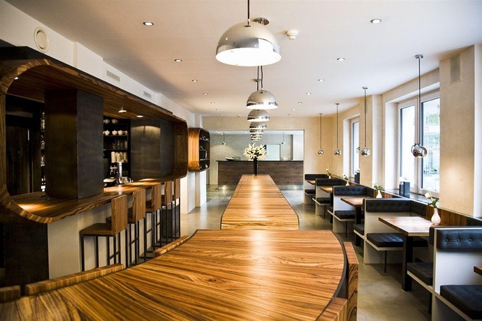 Imagen del bar/restaurante del Hotel Essential by Dorint Art Cologne. Foto 2