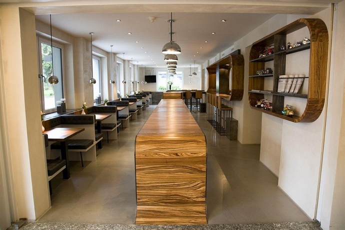 Imagen del bar/restaurante del Hotel Essential by Dorint Art Cologne. Foto 3