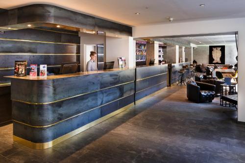 Imagen de los interiores del Hotel Essential by Dorint Art Cologne. Foto 9