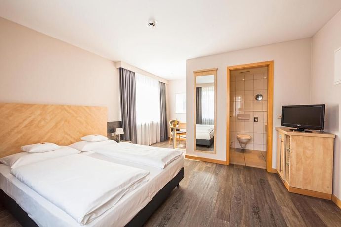 Imagen de la habitación del Hotel Essential by Dorint Art Cologne. Foto 7