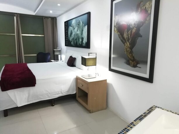 Imagen de la habitación del Hotel Essenzia de Cancun. Foto 20