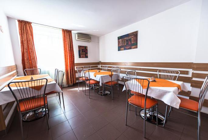 Imagen del bar/restaurante del Hotel Est, Bucarest. Foto 2
