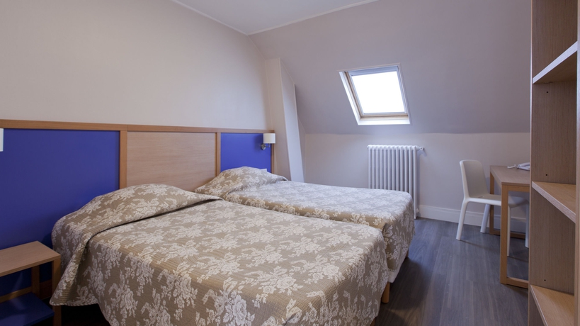 Imagen de la habitación del Hotel Est, Gare du Nord. Foto 6