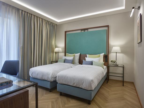 Imagen de la habitación del Hotel Est Grand Savoy. Foto 3