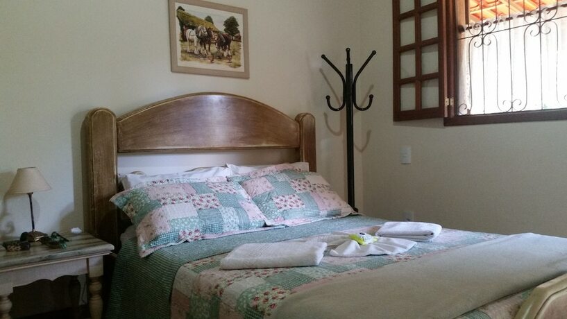 Imagen de la habitación del Hotel Est&acirc;ncia das Angolas - Inhotim. Foto 12