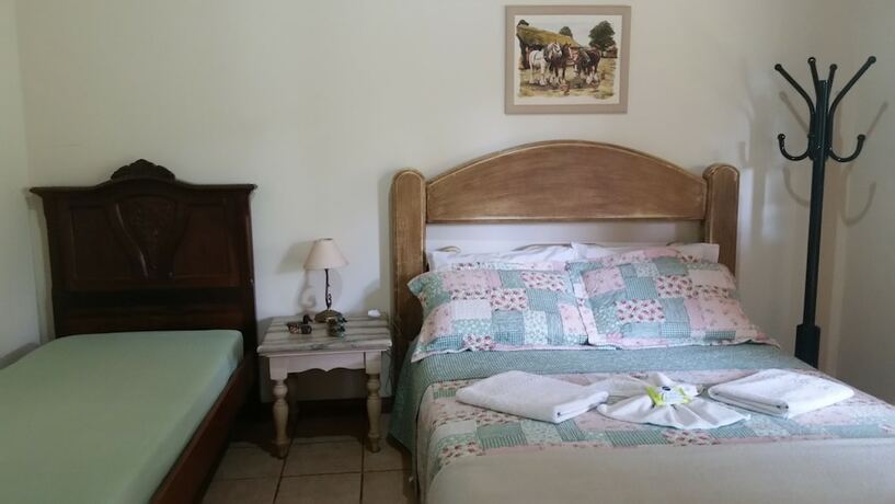 Imagen de la habitación del Hotel Est&acirc;ncia das Angolas - Inhotim. Foto 17