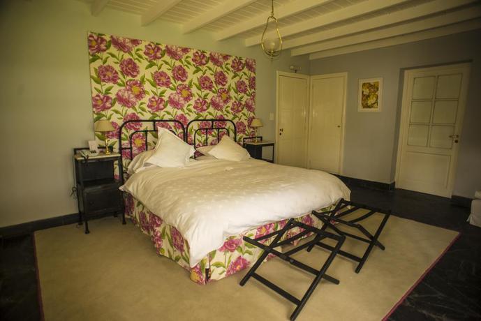 Imagen de la habitación del Hotel Estancia Ave Maria. Foto 11