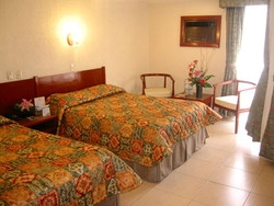 Imagen de la habitación del Hotel Estancia Business Class. Foto 2