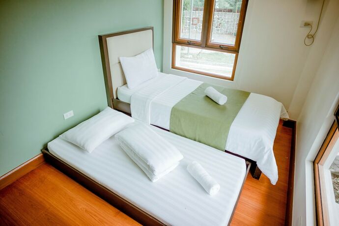 Imagen de la habitación del Hotel Estancia De Lorenzo Tarlac. Foto 17