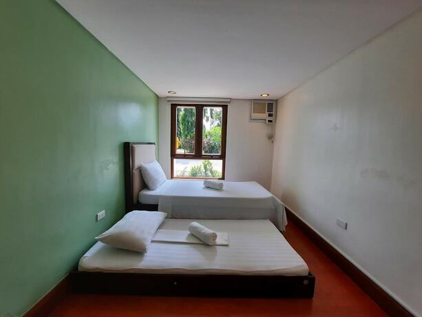 Imagen de la habitación del Hotel Estancia De Lorenzo Tarlac. Foto 18