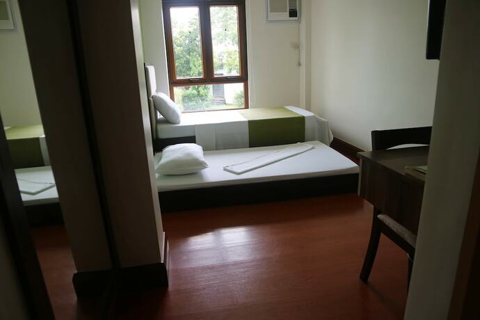 Imagen de la habitación del Hotel Estancia De Lorenzo Tarlac. Foto 20
