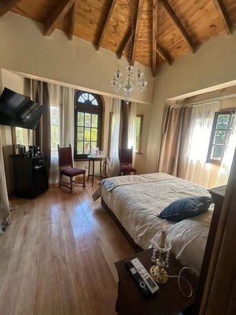Imagen de la habitación del Hotel Estancia La Elena Boutique. Foto 7