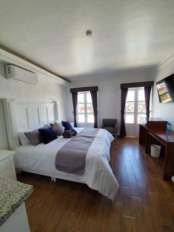 Imagen de la habitación del Hotel Estancia Real. Foto 11