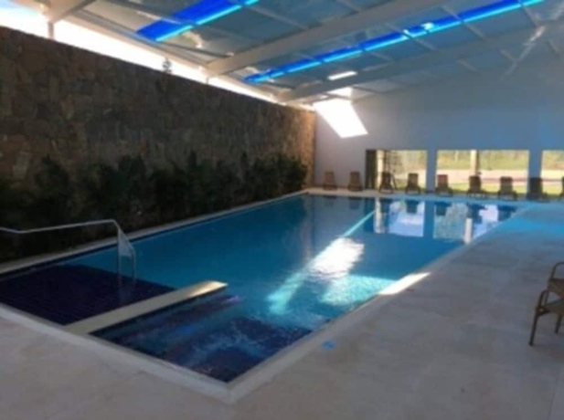 Imagen de la piscina del Hotel Estancia Santa Monica. Foto 16