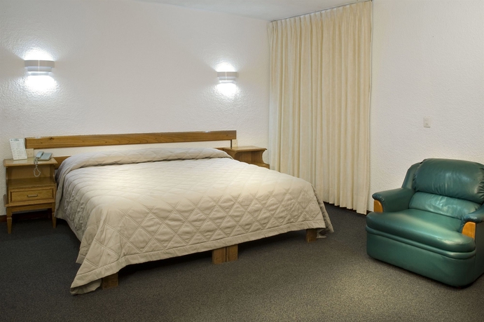 Imagen de la habitación del Hotel Estanza and Suites. Foto 3