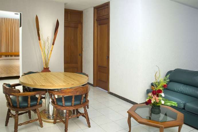 Imagen de la habitación del Hotel Estanza and Suites. Foto 12