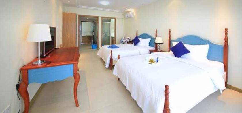 Imagen de la habitación del Hotel Estay Apartment Hidden Bay Huidong. Foto 13