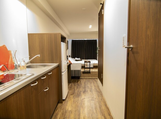 Imagen de la habitación del Hotel E-stay Ebisu. Foto 19