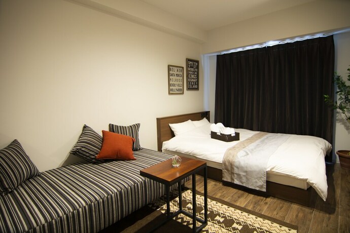 Imagen de la habitación del Hotel E-stay Ebisu. Foto 21