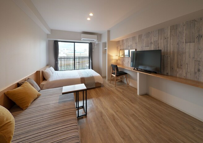 Imagen de la habitación del Hotel E-stay Ebisu. Foto 22